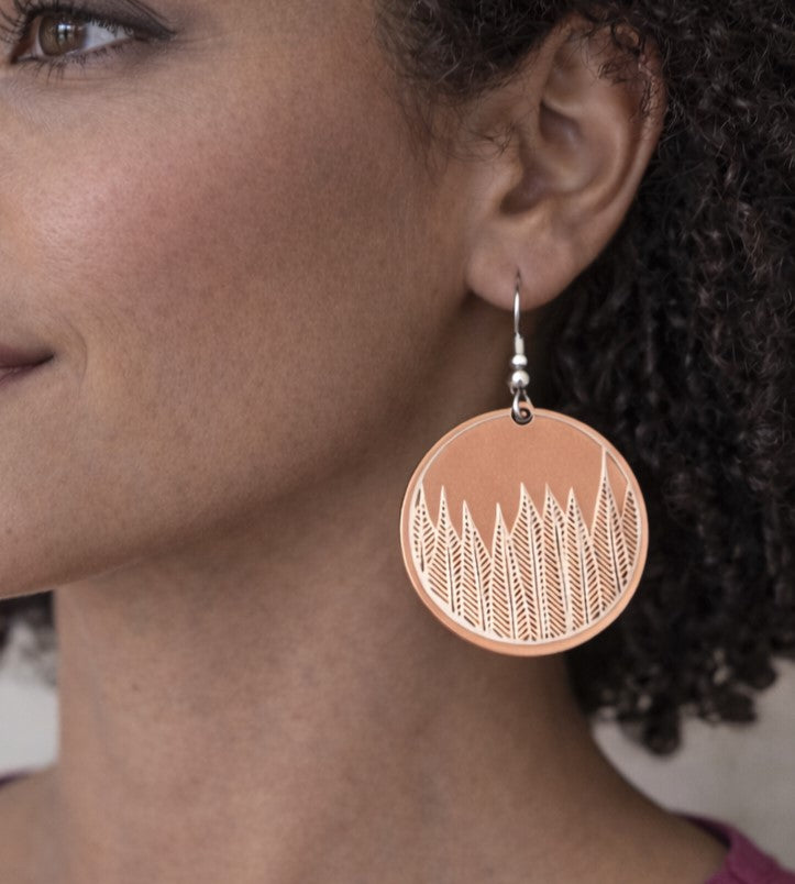 Covaly copper round with silver leaf design earring