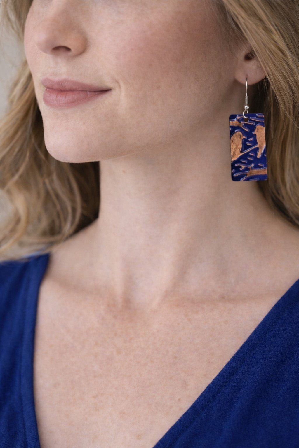 Covaly Metal and copper dark blue with copper birds and tree branches earrings